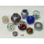 A collection of Cathness and similar paperweights together with 2 quality opalescent glass vases