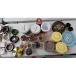 A collection of ceramic and plastic pub advertising ashtrays, jugs, ice buckets ,