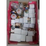 A collection of various Odd box trinket boxes including dogs, horses, clowns,