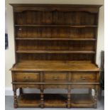 Quality reproduction oak welsh dresser with pot board base