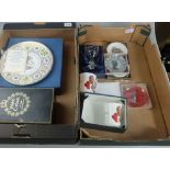 A collection of commemorative glassware and pottery to include Royal Doulton plates,