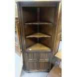 reproduction Carved oak corner cupboard