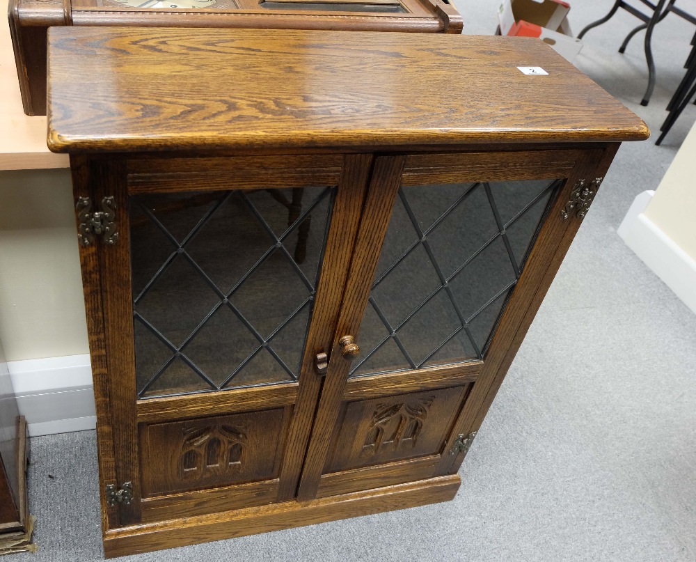 Priory style oak glazed small bookcase