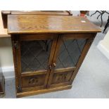 Priory style oak glazed small bookcase