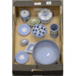 A collection of Wedgwood jasperware to include large footed bowl, flower basket, trinket boxes,