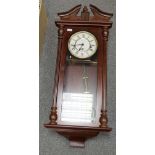 Reproduction mahogany three keyhole wall clock