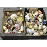 A collection of real decorated eggshells some musical (2 trays)