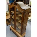French style carved oak bookcase on stand