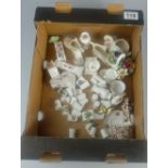 A collection of Royal Worcester miniatures including small ornaments and thimbles (approx 30)