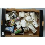 A collection of pottery to include Wedgwood vase, commemorative cups and saucers,