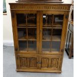 Reproduction Oak linen fold two door bookcase