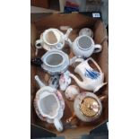 A collection of teapots including Losols Keelings ware, Saddlers,