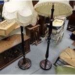 Reproduction carved mahogany lamp stand with shade and another similar (2)