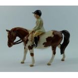 Rare Beswick Boy on Skewbald horse 1500