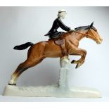 Beswick model of woman sidesaddle on jumping horse 983,