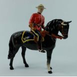 Beswick Mountie on brown horse 1375