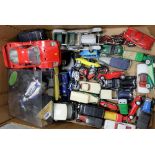 A collection of toy cars by Dinky , Tonk