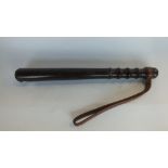 Old wood policemans truncheon numbered 2