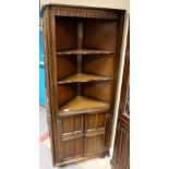 reproduction Carved oak corner cupboard