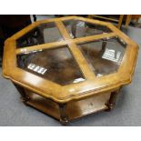 Good quality reproduction oak octagonal coffee table with 4 shaped bevelled glass top inserts