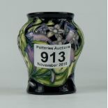 Moorcroft small vase decorated with lilac flowers, height 8.