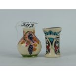 Moorcroft miniature trial vase decorated with fish and another decorated with leaf & berries,