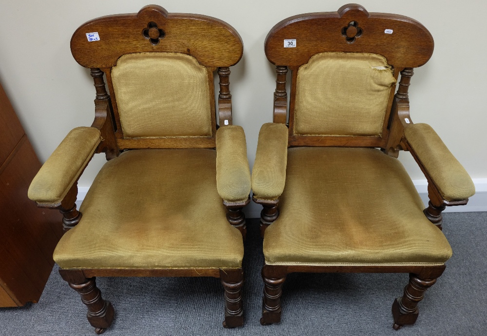 A pair of Victorian Oak Chapel chairs (2)