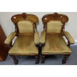 A pair of Victorian Oak Chapel chairs (2)