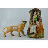 A Burgess and Leigh embossed jug Old Feeding time and a Beswick lioness (2)