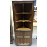 reproduction Carved oak corner cupboard