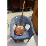 Blue lloyd loom armchair and brass bed warmer (2)