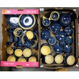 A collection of Denby Imperial blue dinnerware to include cups, tea and coffee pots,