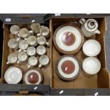 A collection of Denby Langley and Potters Wheel dinnerware to include cups, teapot, plates,