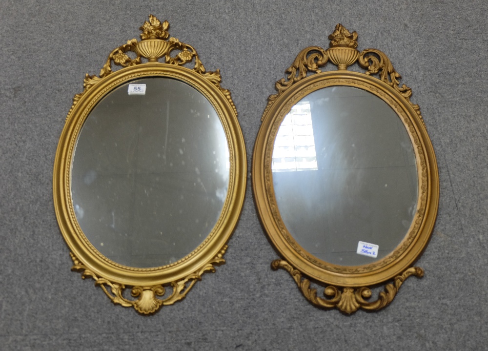 Pair of modern wall mirrors in gold colour (2)