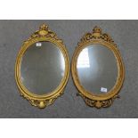 Pair of modern wall mirrors in gold colour (2)