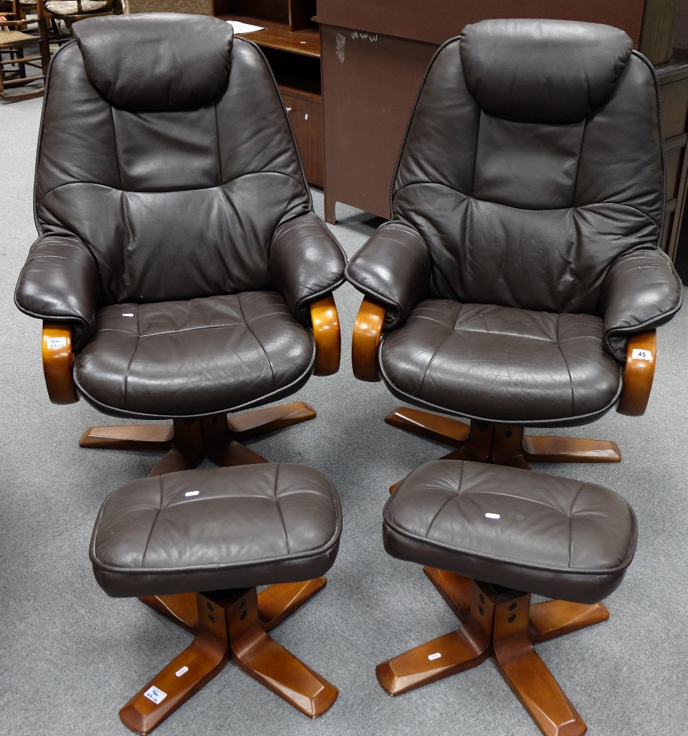 Two leather and wood high back chairs with matching stools