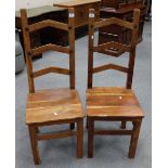 Two Indonesian ladder back chairs (2)