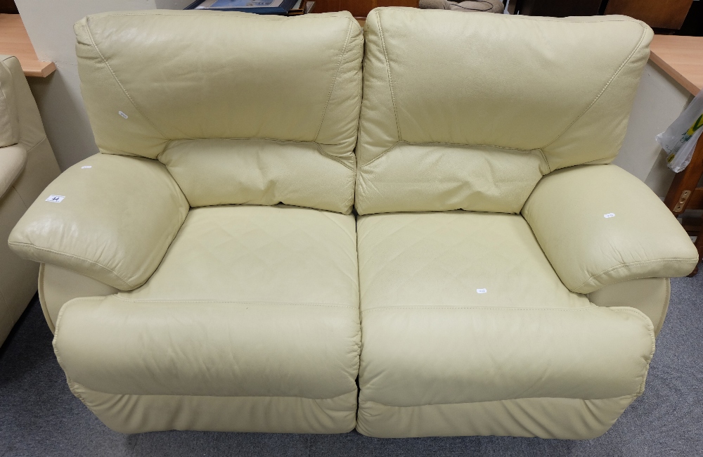 Cream reclining 2 seater settee