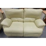Cream reclining 2 seater settee