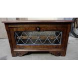 Oak glass fronted television cabinet