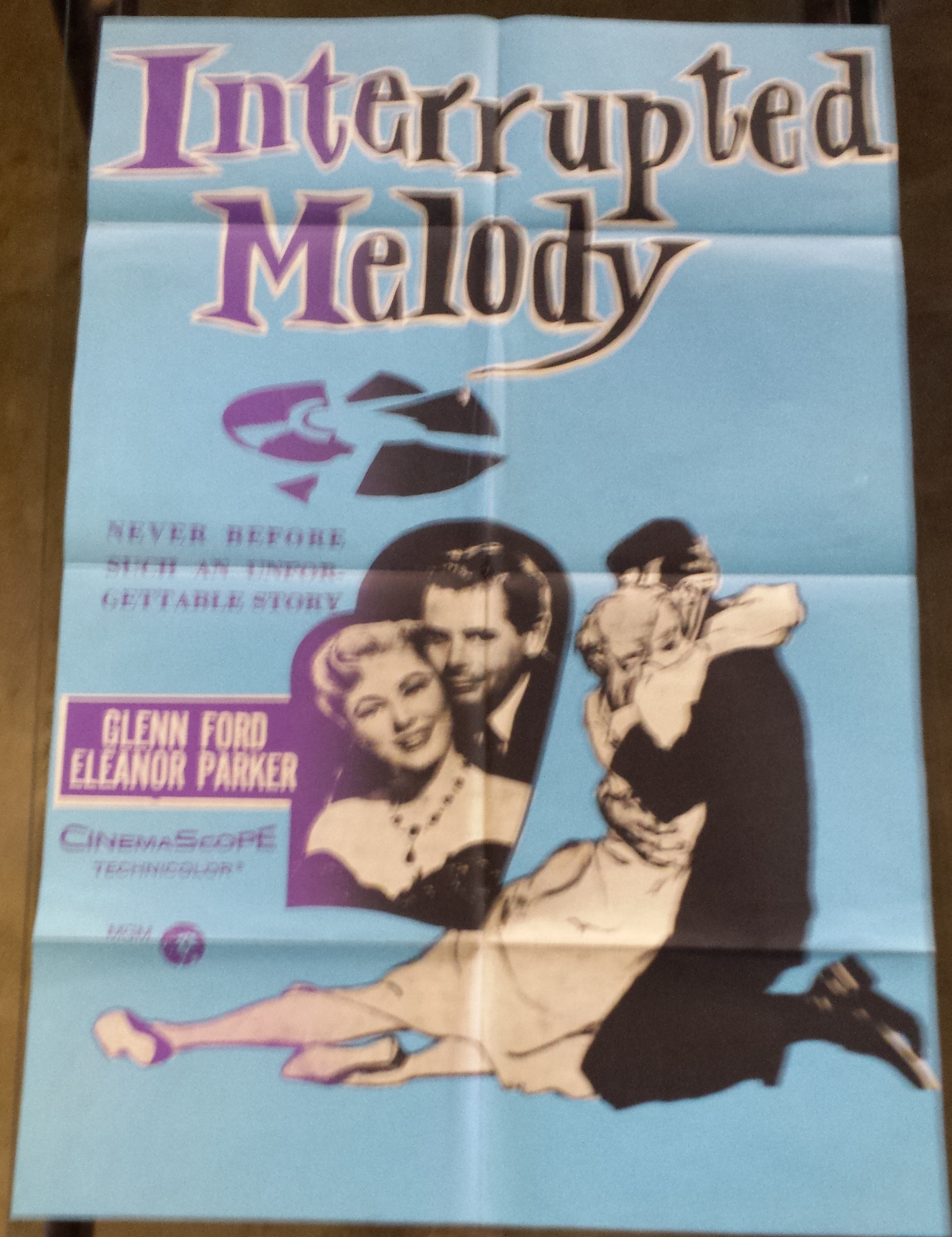 A Vintage "Interrupted Melody" Film Poster M-G-M. Folded. 1010 x 68mm