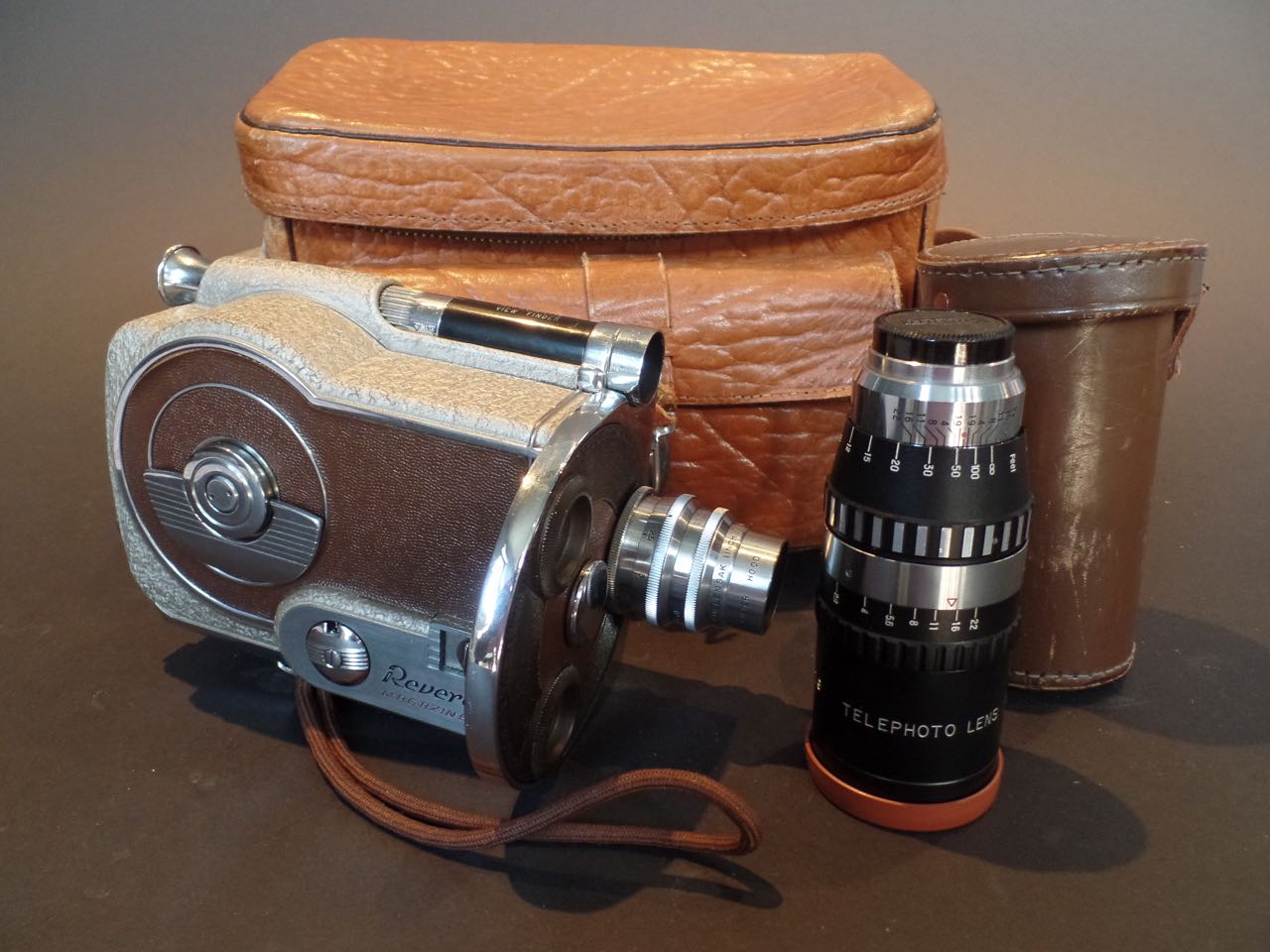 Revere's Model 16mm Magazine Turret Camera In original leather carrying case.