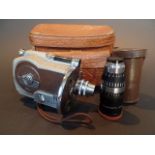 Revere's Model 16mm Magazine Turret Camera In original leather carrying case.