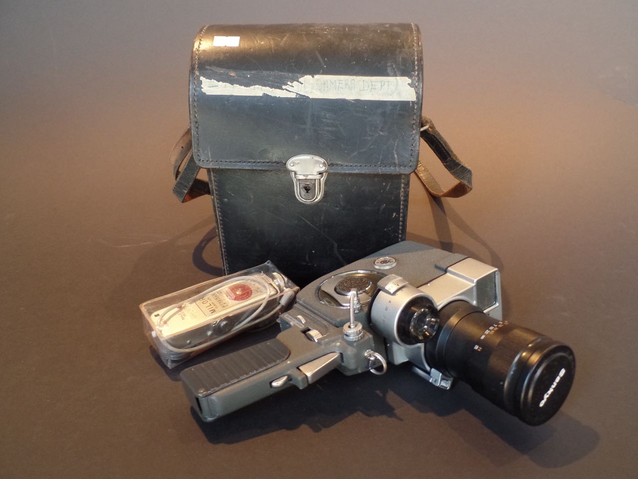 Sankyo Zoom 8 Cine Camera With accessories, serial number 61720, in leather carrying case.