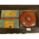 1955 Military leather cased Rabone 100ft rule with original box and cased Parralel Rolling rule