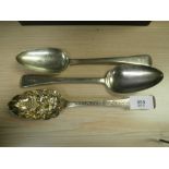 Pair of Victorian silver table spoons and a berry spoon