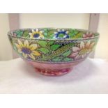 A Maling lace pattern Chelsea bowl, decorated with bands of polychrome flowers and green leaves with