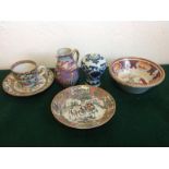 Six 'antique' Chinese export ceramic pieces - a teacup and bowl, a plate, a dish, a jug and blue-
