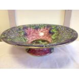 A large Maling blue-daisy pattern bowl of shallow circular form decorated with leaves and flowers on