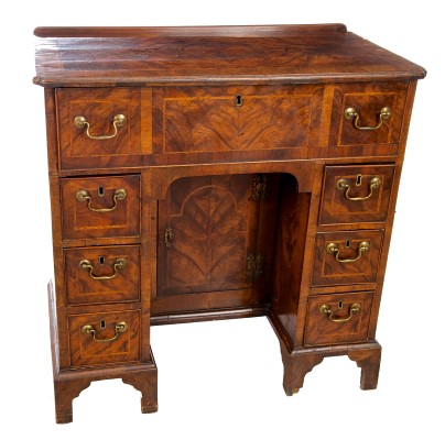 Georgian and later walnut knee-hole writing desk with crossbanded decoration, quarter-veneered top